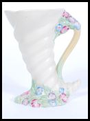 An early 20th century Clarice Cliff ' My Garden '  pattern Cornucopia vase model no 809 being marked