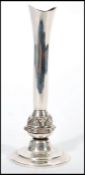 A hallmarked silver stem / solifleur vase by Mappin & Webb having a bulbous knop decorated with