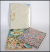 A collection of stamps dating from the 19th century comprised within three albums containing