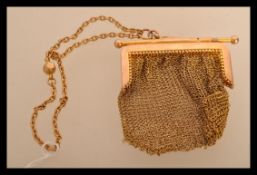 A 9ct gold ladies mesh purse having a yellow metal