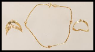 A hallmarked 9ct gold box chain and ball bracelet together with two hallmarked 9ct gold wishbone