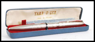 A vintage 20th Century silver hallmarked Yard O Led propelling pencil complete in fitted case.