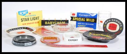 A collection of vintage retro 20th Century breweriana advertising point of sale items to include