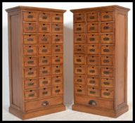 A pair of 20th century / contemporary hardwood Industrial 25 drawer pedestal chests. Each chest of