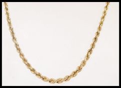 A hallmarked 9ct gold twisted necklace having a spring ring clasp. Hallmarked with import marks