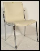 An Italian contemporary white leather side / dining / hall chair with having shaped chromed steel