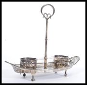 An early 20th Century Mappin and Webb silver hallmarked cruet set stand having a pierced