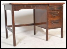 A vintage retro 20th century Art Deco 1940's Air Ministry type oak utility office industrial desk