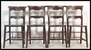 A set of 4 Victorian 19th century beech and elm wood chapel - dining chairs. Turned legs united by