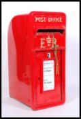 A replica Victorian style ' Royal Mail ' cast iron post box. Opening from, with hand painted
