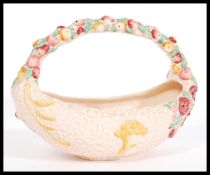 An early 20th century Clarice Cliff  ' Celtic Harvest ' lozenge shaped basket. Typically decorated