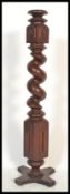 A 19th Century Victorian Mahogany barleytwist torchere plant jardiniere stand raised on plinth