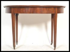 A 19th century George III mahogany d-end console hall  table. Raised on square tapering legs , above