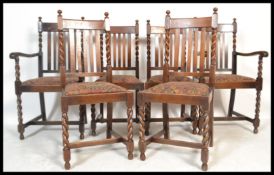 A set of six early 20th Century circa 1940 oak barley twist rail back dining chairs, the set
