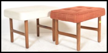 A pair of retro 20th Century teak wood stools / ottomans, raised on H - frame supports having button