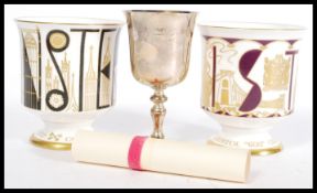 A silver hallmarked Barker Ellis Silver Co. goblet engraved with the Bristol coat of arms (