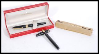 A cased Shaffer 14k nib fountain pen / ink pen together with a vintage 20th Century fountain /ink