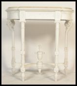 A Victorian 19th century white painted marble top console table. Raised on reeded tapering legs with