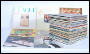 A collection of vinyl Long Play Lp records featuring various artists and genres to include Human