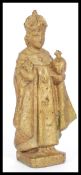 A 19th Century Grand Tour gilt metal religious ecclesiastical figurine depicting the Infant Jesus of