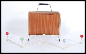 A retro 20th Century wall hanging ' W 'shape wall hanging atomic coat hooks with ball finials,