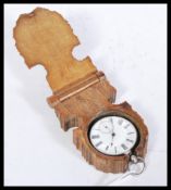 A vintage early 20th Century fine silver pocket watch having a white enamel face with Roman