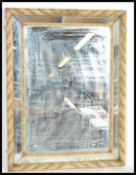 A large 19th century decorative Venetian cushion wall mirror having gilt detailing with a notched