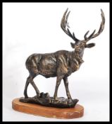 A large and impressive 20th century antique style bronze effect figure of a Deer / Stag. Mounted