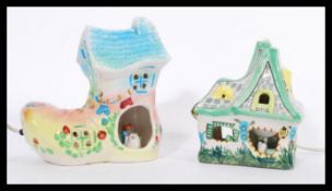 Two novelty ceramic children's lights to include the old woman who lived in a shoe boot lamp with