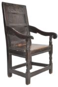 A 17TH CENTURY CARVED OAK WAINSCOT CHAIR DETAILED WITH DRAGONS