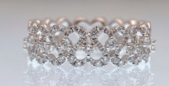 AN 18CT WHITE GOLD LADIES HALF ETERNITY RING OF HE