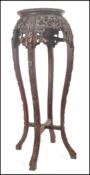 A 19th century Chinese carved rosewood / padouk plant stand - jardiniere. Of upright form with