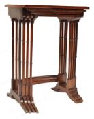 AN EDWARDIAN MAHOGANY INLAID QUARTETTO NEST OF TABLES