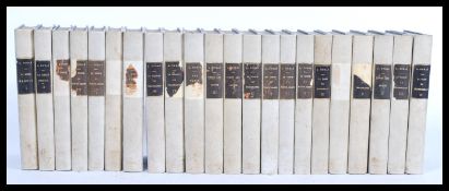 22 early 20th Century french hard backed and marbl