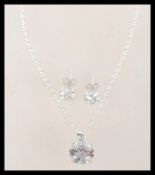 A sterling silver demi parure suite set of cz jewe