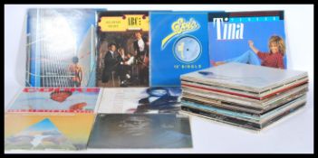 A collection of vinyl long play LP and 12
