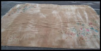 A large 20th Century Chinese floor carpet rug on a