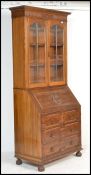 A good, circa 1920's Jacobean revival solid oak bu