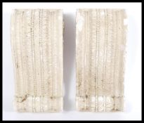 A pair of 19th century plaster wall bracket embell