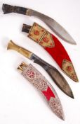 TWO 20TH CENTURY MIDDLE EASTERN KUKRI KNIVES