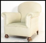 A late 19th early 20th Century armchair in the man