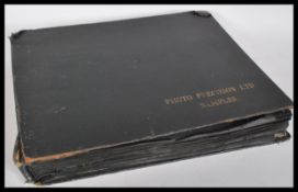 A mid to late 20th Century vintage postcard album