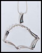 A sterling silver blue topaz suite consisting of p