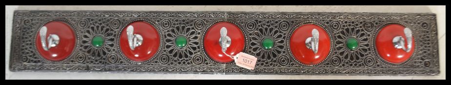 A 20th Century Moroccan coat hook having decorativ
