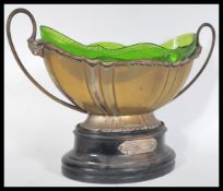 An early 20th Century twin handled silver plated E