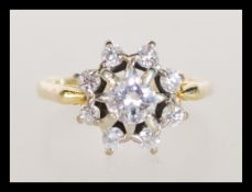 An 18ct gold 1.3 carat diamond cluster ring having