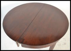 A 19th Century Georgian mahogany line inlay demi l