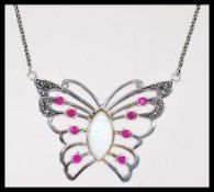 A sterling silver Cz and central paneled opal pend