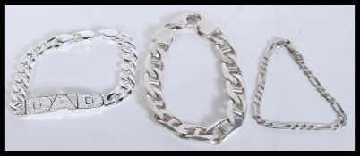 A selection of silver bracelets to include a flat
