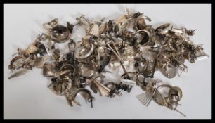 A large selection of silver earrings to include dr